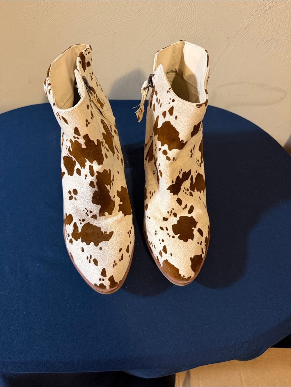 MIA Cowhide-Print Ankle Booties in White & Brown
